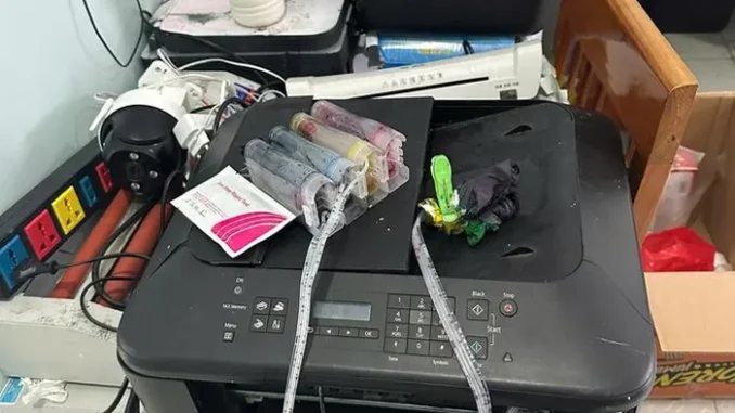 Bắt quả tang đối tượng in tiền giả Bắt quả tang đối tượng in tiền giả