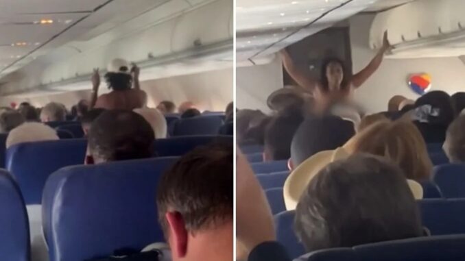 Nữ hành khách 'không mặc đồ' đi lại trên máy bay suốt 25 phút Nữ hành khách 'không mặc đồ' đi lại trên máy bay suốt 25 phút