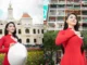Hoa hậu Lý Kim Thảo thướt tha trong tà áo dài đỏ thêu bồ câu trắng