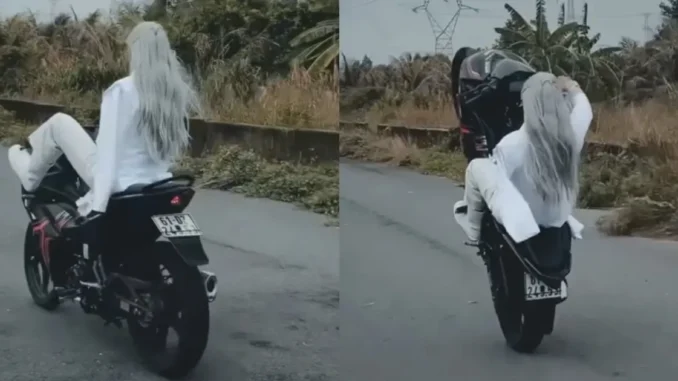 Người đàn ông điều khiển xe máy bằng chân, “bốc đầu” bằng 1 tay ở Bình Dương Người đàn ông điều khiển xe máy bằng chân, “bốc đầu” bằng 1 tay ở Bình Dương