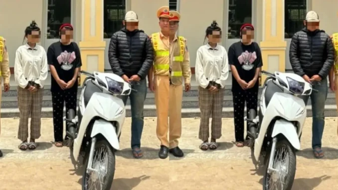 Cặp nam nữ đi xe máy một bánh, bốc đầu trên đường phố Cặp nam nữ đi xe máy một bánh, bốc đầu trên đường phố